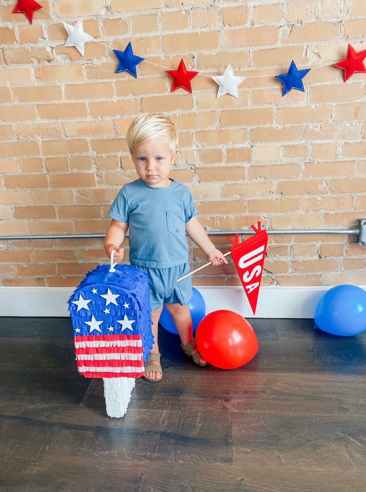 July Popsicle piñata (red,white,blue strips)
